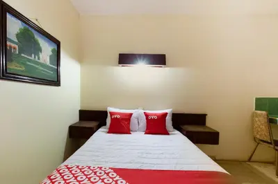 Cama o camas de una habitación en OYO Hotel Emperador, Oaxaca