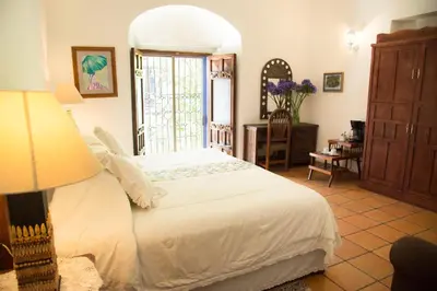 Cama o camas de una habitación en Casa de Siete Balcones Hotel Boutique