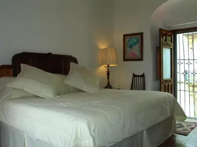 Cama o camas de una habitación en Casa de Siete Balcones Hotel Boutique