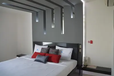 Cama o camas de una habitación en Auto Hotel Mediterráneo