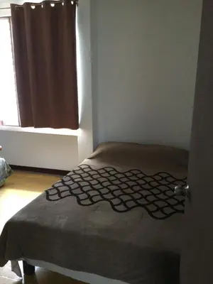Cama o camas de una habitación en Trotamundo Oaxaca Hostel