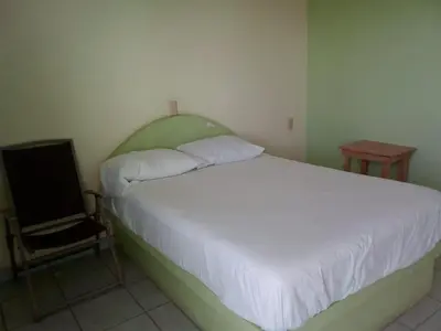 Cama o camas de una habitación en Hotel Azulejos