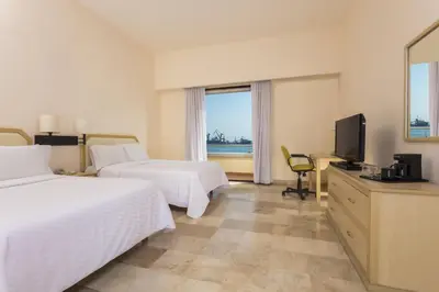 Cama o camas de una habitación en Fiesta Inn Veracruz Malecon
