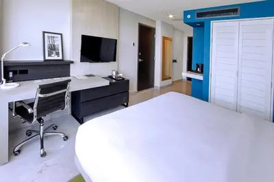 Una televisión o centro de entretenimiento en DoubleTree by Hilton Veracruz