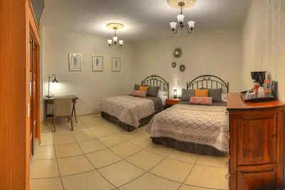 Cama o camas de una habitación en Hotel Santa Paula