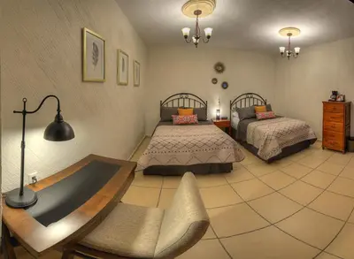 Cama o camas de una habitación en Hotel Santa Paula