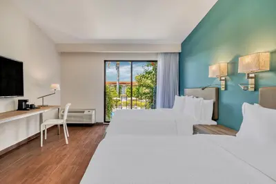 Cama o camas de una habitación en Fiesta Inn Oaxaca