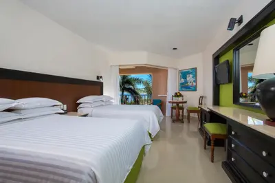Cama o camas de una habitación en Barceló Huatulco - All Inclusive