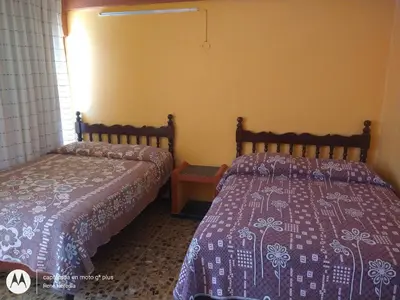 Cama o camas de una habitación en Hotel Olimar