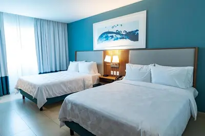 Cama o camas de una habitación en Holiday Inn Acapulco La Isla by IHG