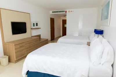 Cama o camas de una habitación en Holiday Inn Acapulco La Isla by IHG