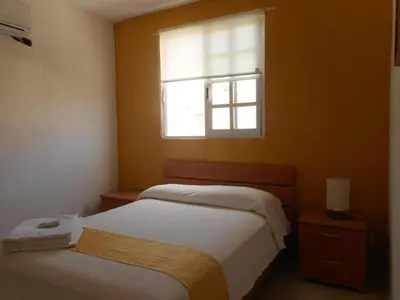 Cama o camas de una habitación en Hermosa Casa Acapulco Diamante Hospedaje a 5 min de la playa
