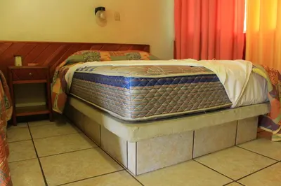 Cama o camas de una habitación en Hotel Avenida