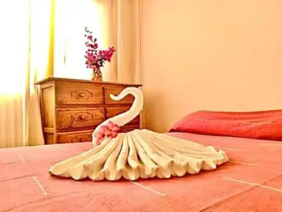 Cama o camas de una habitación en Hotel Cordelia's