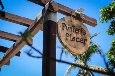Certificado, premio, señal o documento que está expuesto en Cabañas Punta Placer
