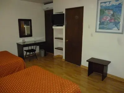 Cama o camas de una habitación en Hotel La Casona del Llano