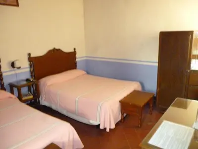 Cama o camas de una habitación en Hotel Monte Alban - Solo Adultos