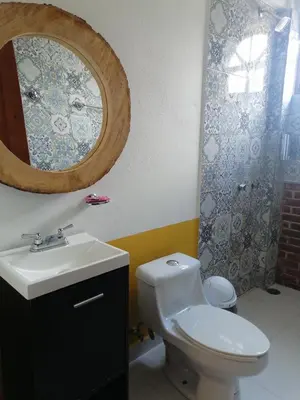Un baño de Hotel Y Suites Axolotl