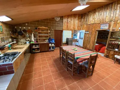 Una cocina o zona de cocina en Cabañas Los Abuelos
