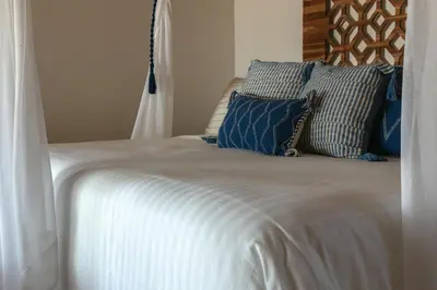 Cama o camas de una habitación en Casa Kundavi Beach Front Paradise