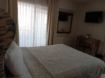 Cama o camas de una habitación en Hotel Real de San Diego