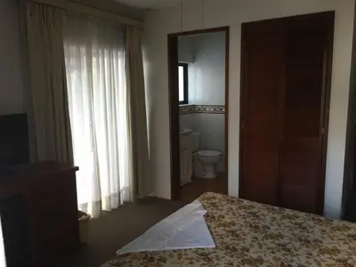 Cama o camas de una habitación en Hotel Real de San Diego