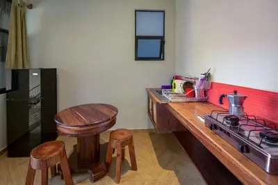 Una cocina o zona de cocina en Coccoloba Guest House