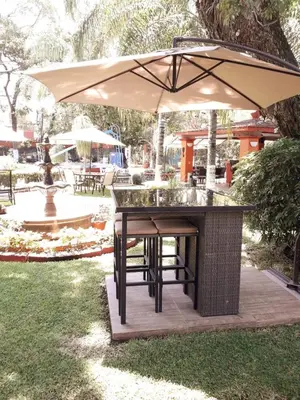 Jardín al aire libre en Villa Paraiso