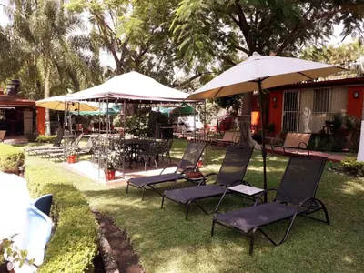 Jardín al aire libre en Villa Paraiso