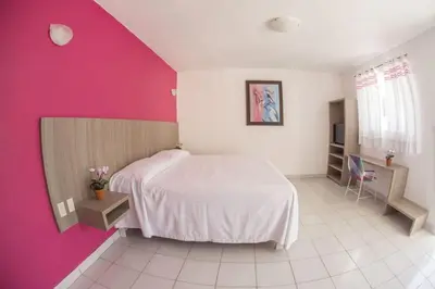 Cama o camas de una habitación en Hotel Santa Cruz Juchitan