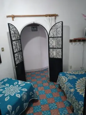 Cama o camas de una habitación en Hotel Las Palomas