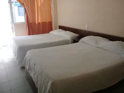 Cama o camas de una habitación en HOTEL PARAISO ACAPULCO