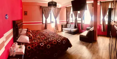 Cama o camas de una habitación en HOTEL LA GRAN MANZANA