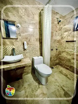 Un baño de HOTEL LA GRAN MANZANA