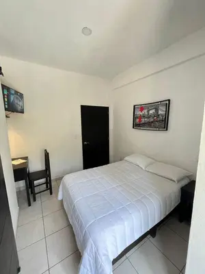 Cama o camas de una habitación en HOTEL BOUTIQUE ÁRBOL De LA VIDA