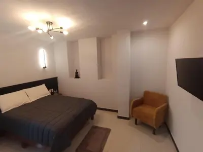 Cama o camas de una habitación en HOTEL BOUTIQUE ÁRBOL De LA VIDA