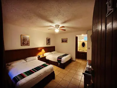 Cama o camas de una habitación en Hotel Hacienda Ventana del Cielo