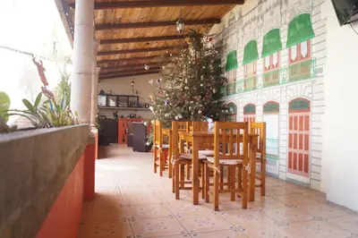 Un restaurante o sitio para comer en Hotel Posada San Antonio Coatepec