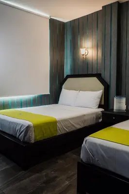 Cama o camas de una habitación en HOTEL CAREYES