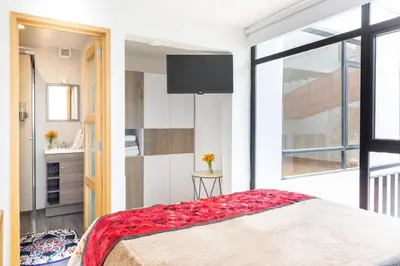 Cama o camas de una habitación en Loft Exclusivo en el Corazón de Coyoacán