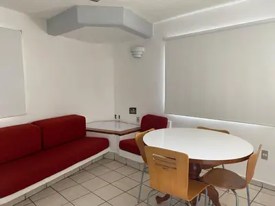 Zona de estar de Hotel Suites Regina