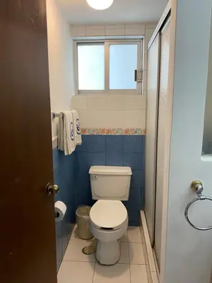 Un baño de Hotel Suites Regina
