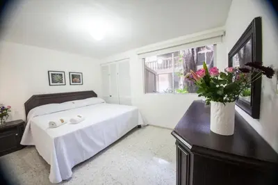 Cama o camas de una habitación en Suites Lafragua