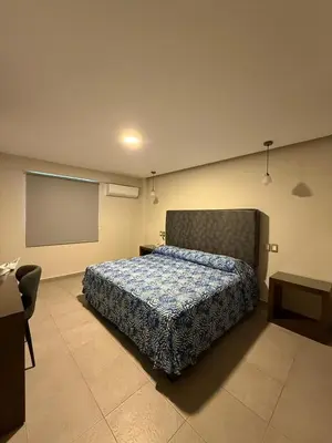 Cama o camas de una habitación en Hotel Impala Veracruz