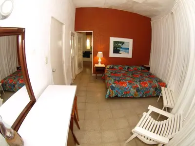 Cama o camas de una habitación en Hotel Flamingos