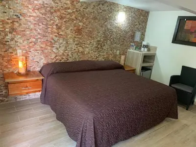 Cama o camas de una habitación en Bon Jesus Hotel
