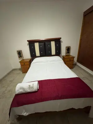 Cama o camas de una habitación en VILLA COSTERA HOTEL BOUTIQUE