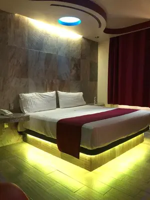 Cama o camas de una habitación en Hotel Jard Inn Adult Only