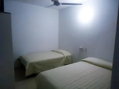 Cama o camas de una habitación en Hotel Olas Huatulco