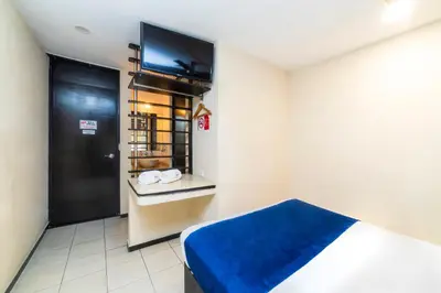 Cama o camas de una habitación en Hotel Kapu, Puebla